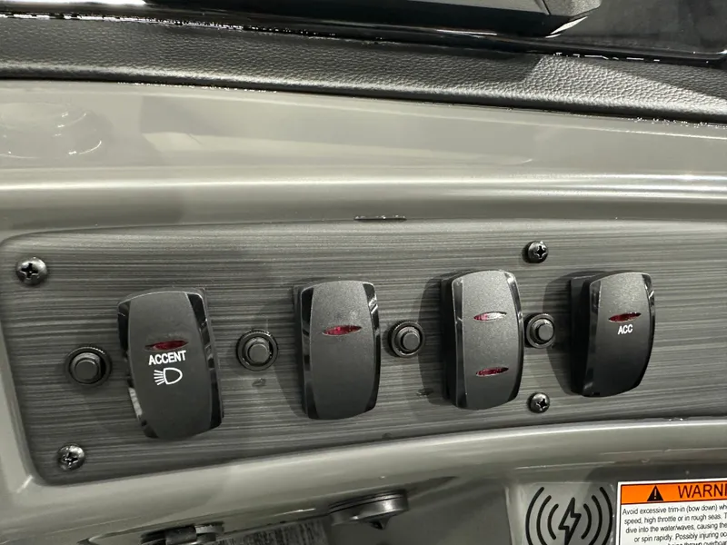 Slide: The Image of Control panel of 2025 Bennington 22SSRSE boat with accent and accessory switches. - 30