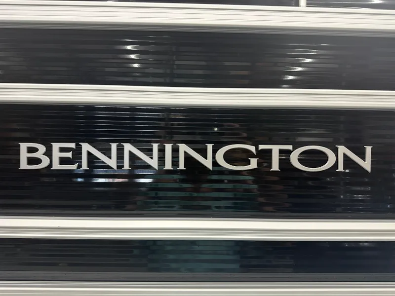 Slide: The Image of Bennington 22SSRSE 2025 model logo on sleek black surface. - 33