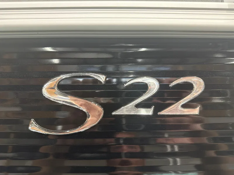 Slide: The Image of 2025 Bennington 22SSRSE boat emblem on black background. - 34