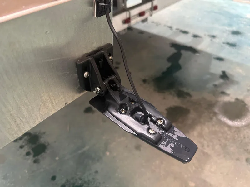 Slide: The Image of 2025 Bennington 22SSRSE boat transducer installation detail. - 8