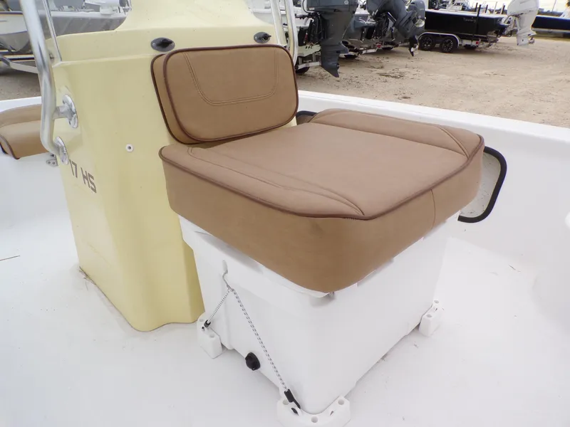 Slide: The Image of 2024 K2 Powerboats 17HS seat with tan cushion on white base. - 13