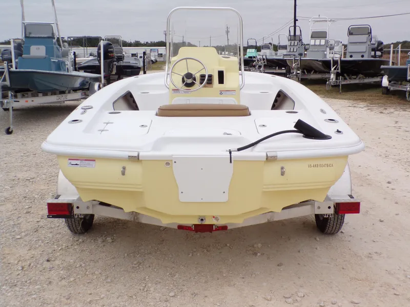 Slide: The Image of 2024 k2 Powerboats 17HS, yellow and white, on trailer in outdoor lot. - 15