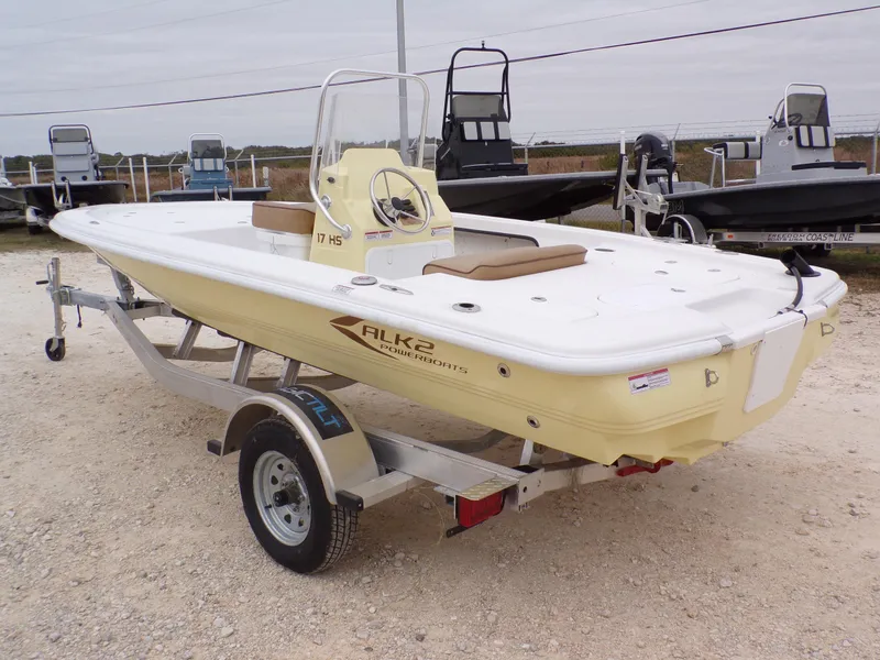 Slide: The Image of 2024 K2 Powerboats 17HS on trailer, displayed outdoors. - 16