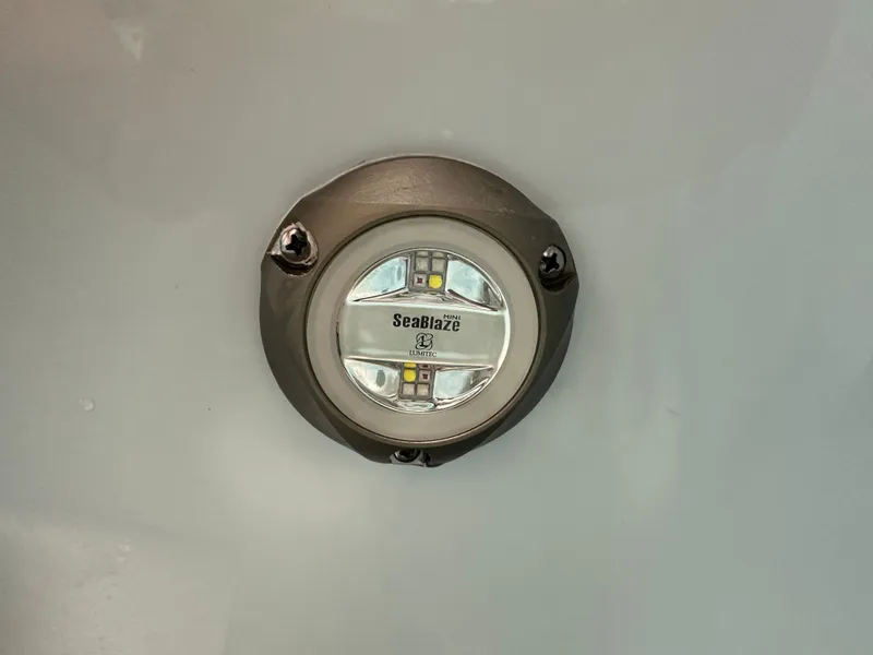 Slide: The Image of LED light fixture on 2025 Key West 230BR boat, featuring SeaBlaze Mini by Lumitec. - 17