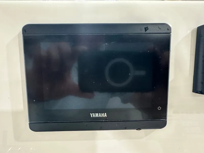 Slide: The Image of Yamaha display screen on 2025 Key West 230BR boat dashboard. - 27