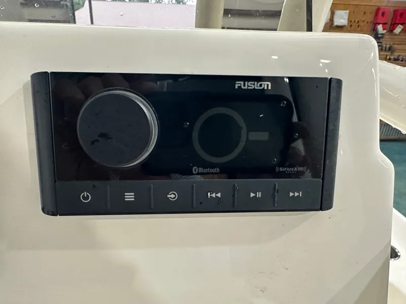 Slide: The Image of Fusion audio system on 2025 Key West 230BR boat dashboard. - 28