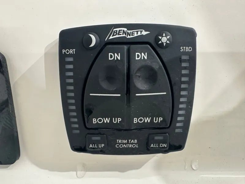 Slide: The Image of Bennett trim tab control panel on 2025 Key West 230BR boat. - 29