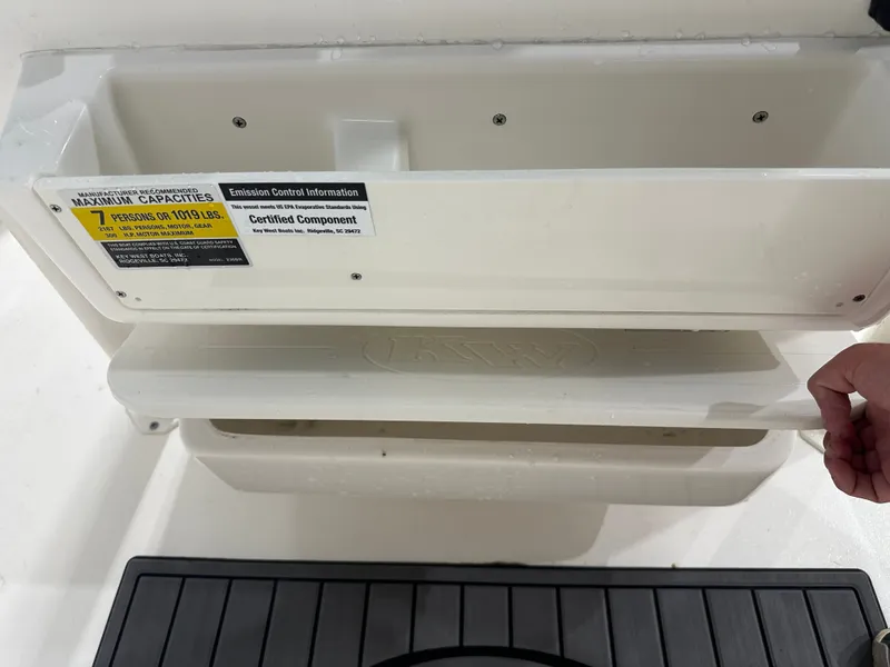 Slide: The Image of 2025 Key West 230BR boat capacity label, showing maximum weight and passenger limits. - 38