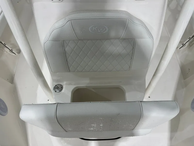Slide: The Image of Key West 230BR 2025 boat seat with diamond stitching and KW logo, wet from water. - 40