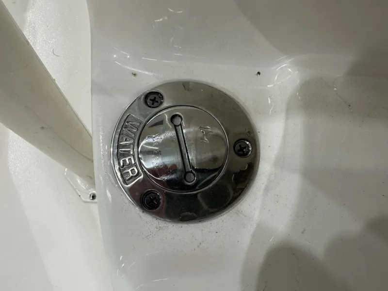 Slide: The Image of Water fill cap on 2025 Key West 230BR boat, stainless steel finish. - 41