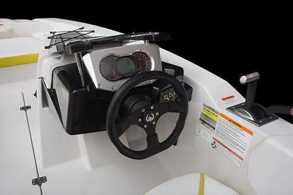 Slide: The Image of 2017 Scarab 165 G boat dashboard with steering wheel and gauges. - 7