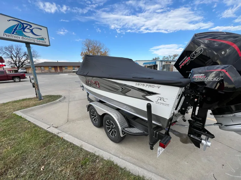 Slide: The Image of 2024 Lund 1875 Pro-V boat on trailer at Premier Boating Center. - 6