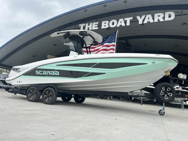 Slide: The Image of 2022 Scarab 255 Open ID boat displayed at The Boat Yard. - 11