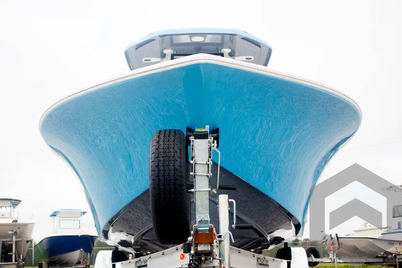 Slide: The Image of 2025 Tidewater 2500 Carolina Bay boat on trailer, viewed from front. - 11