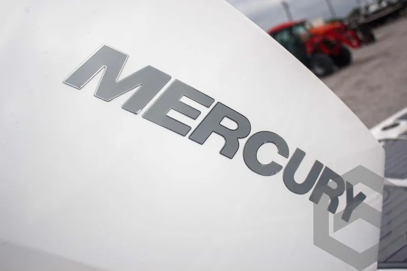 Slide: The Image of Close-up of Mercury engine logo on 2025 Tidewater 2500 Carolina Bay boat. - 15