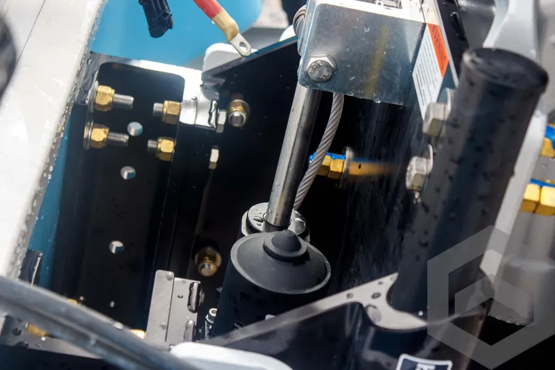 Slide: The Image of Close-up of 2025 Tidewater 2500 Carolina Bay boat engine components. - 24