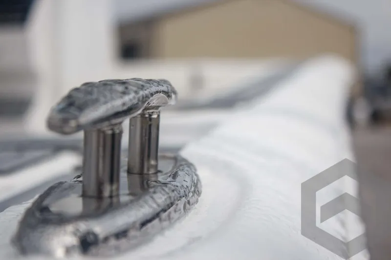 Slide: The Image of Close-up of 2025 Tidewater 2500 Carolina Bay boat cleat, showcasing sleek design and craftsmanship. - 27