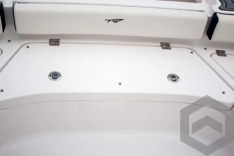 Slide: The Image of 2025 Tidewater 2500 Carolina Bay boat interior detail with storage compartments. - 30