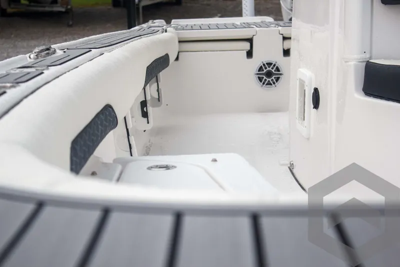Slide: The Image of 2025 Tidewater 2500 Carolina Bay boat interior with sleek seating and modern design. - 34