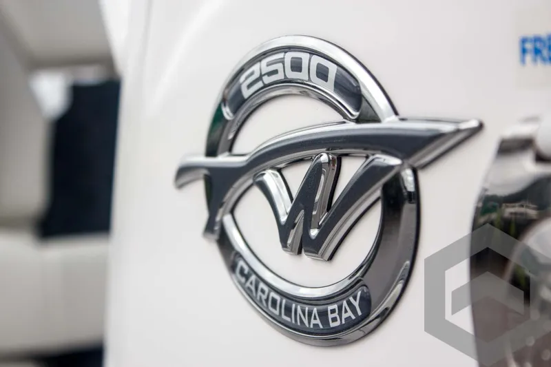 Slide: The Image of 2025 Tidewater 2500 Carolina Bay logo on boat exterior. - 39