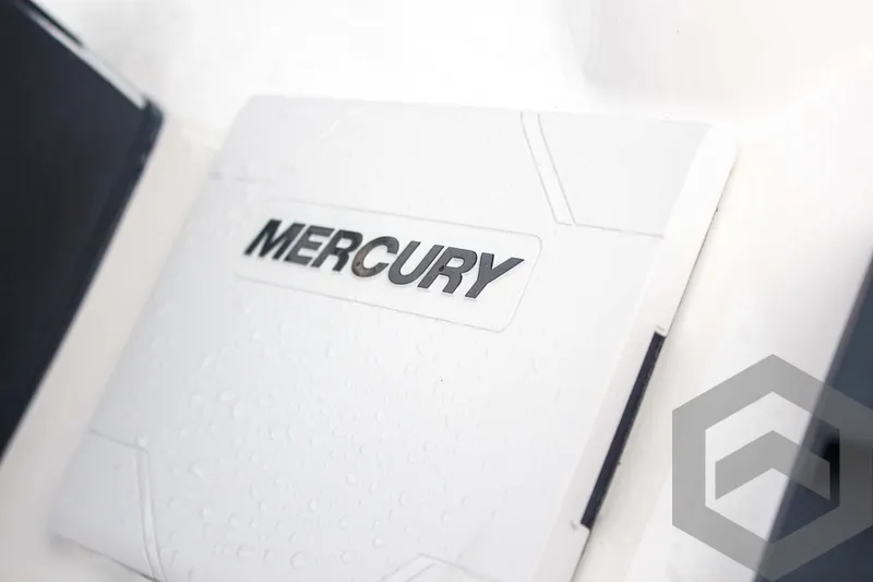Slide: The Image of Mercury engine cover on 2025 Tidewater 2500 Carolina Bay boat, featuring sleek design. - 43