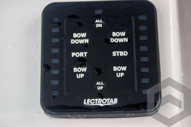 Slide: The Image of Lectrotab control panel on 2025 Tidewater 2500 Carolina Bay boat. - 48