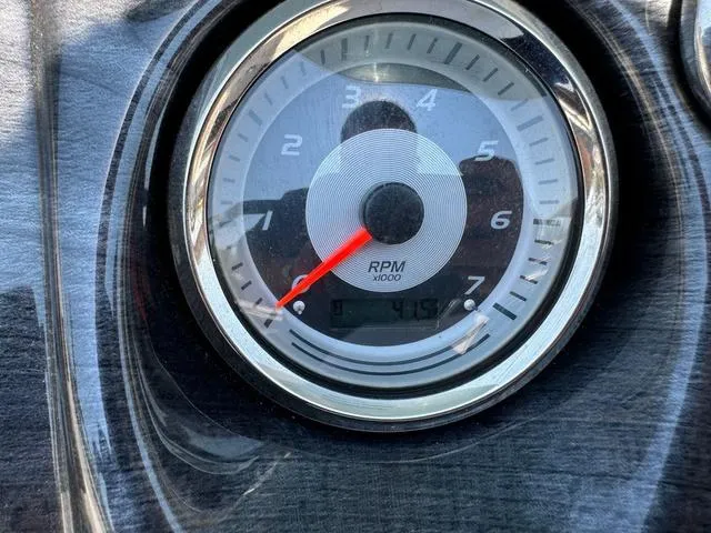 Slide: The Image of Close-up of a 2021 Tahoe LTZ Versatile Rear Lounger tachometer showing RPM. - 14