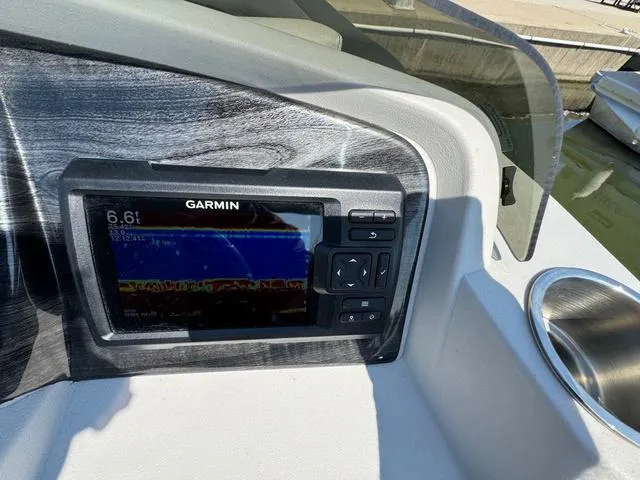 Slide: The Image of Garmin fishfinder on 2021 Tahoe LTZ Versatile Rear Lounger boat dashboard. - 18