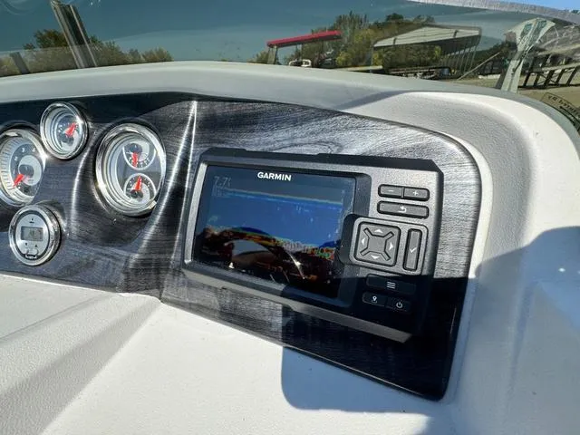 Slide: The Image of Dashboard of 2021 Tahoe LTZ Versatile Rear Lounger 24' with Garmin display and gauges. - 20