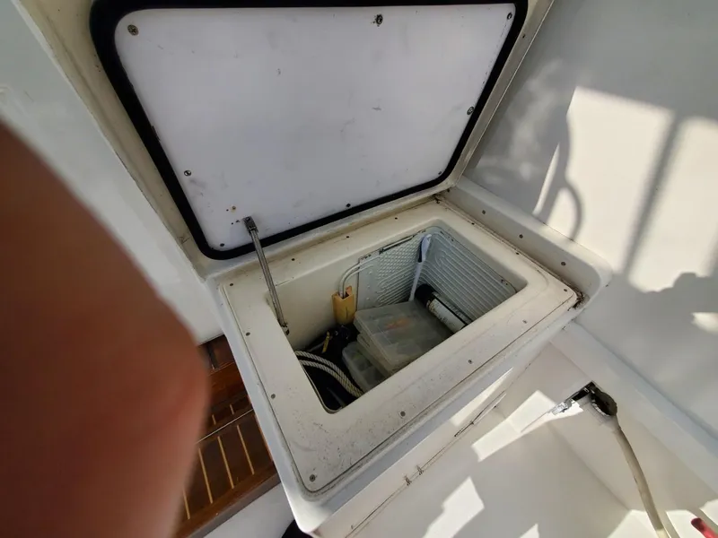 Slide: The Image of Open storage compartment on 1988 Post 46 Sportfish boat. - 11