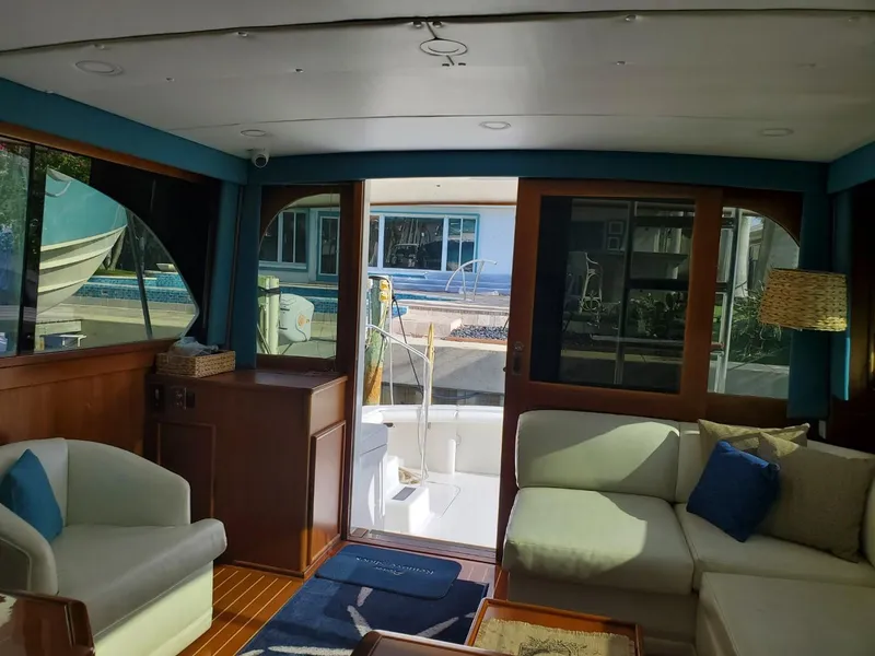 Slide: The Image of Interior of 1988 Post 46 Sportfish yacht with cozy seating and large windows. - 33