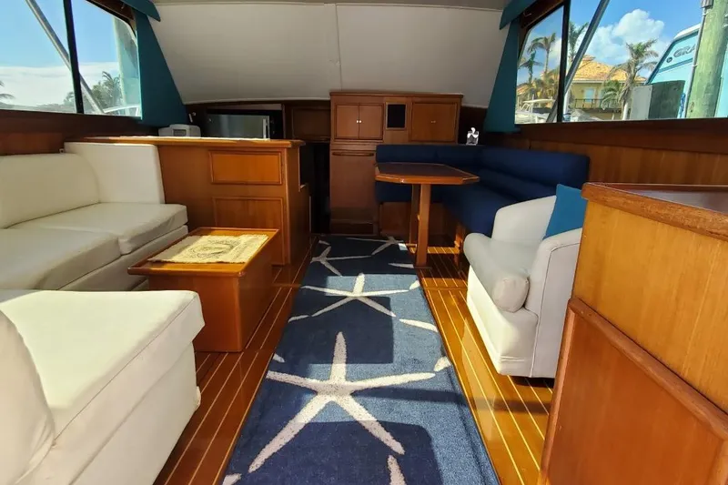 Slide: The Image of Interior of 1988 Post 46 Sportfish yacht with elegant seating and nautical decor. - 35
