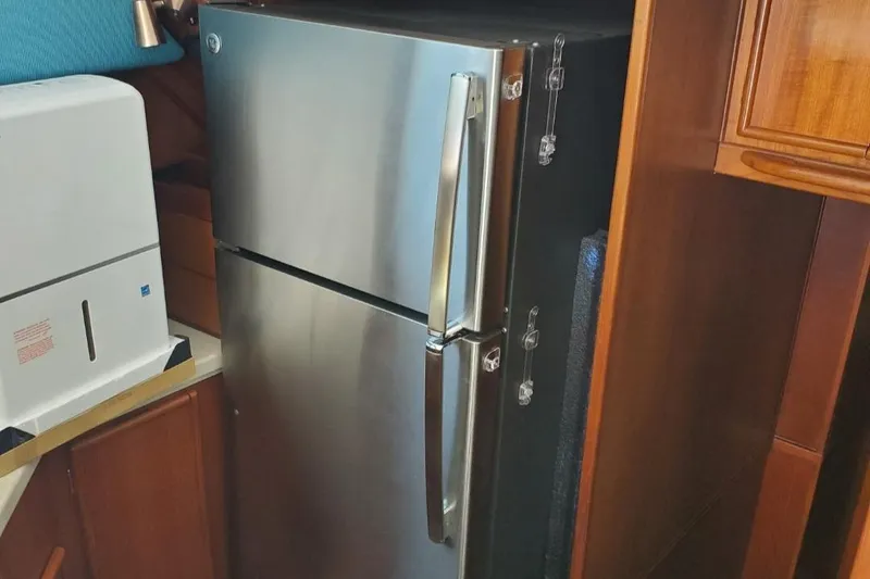 Slide: The Image of Stainless steel refrigerator in 1988 Post 46 Sportfish yacht kitchen. - 37