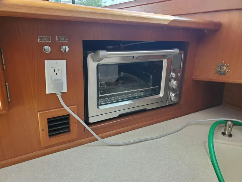 Slide: The Image of 1988 Post 46 Sportfish kitchen with built-in toaster oven and electrical outlet. - 39