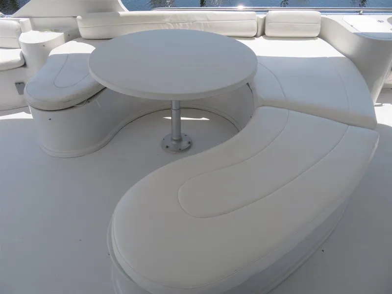 Slide: The Image of Luxurious seating area on 2000 Bluewater Yachts Millennium Series 63. - 11