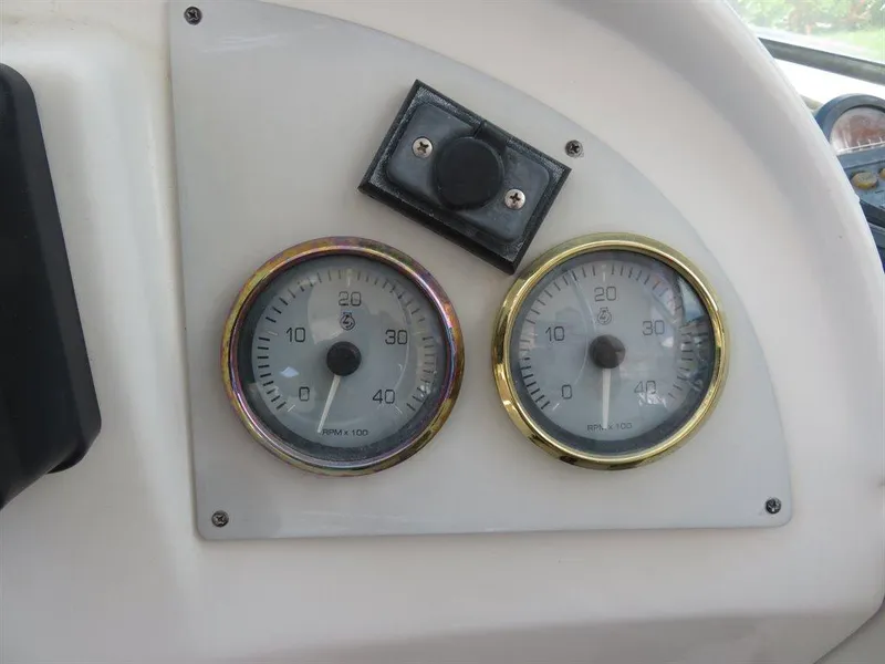 Slide: The Image of Dashboard gauges of 2000 Bluewater Yachts Millennium Series 63 boat. - 27