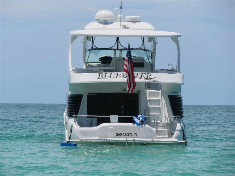 Slide: The Image of Bluewater Yachts Millennium Series 63, 2000 model, anchored in Sarasota, FL waters. - 7
