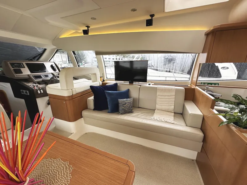 Slide: The Image of Luxurious interior of 2014 Ferretti Yachts 530 with modern seating and elegant decor. - 14