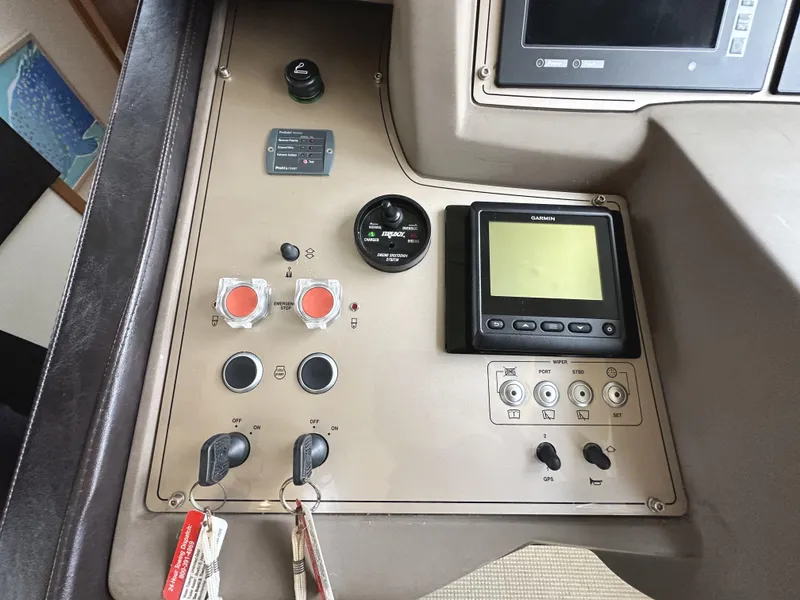 Slide: The Image of Control panel of a 2014 Ferretti Yachts 530 with navigation instruments. - 21