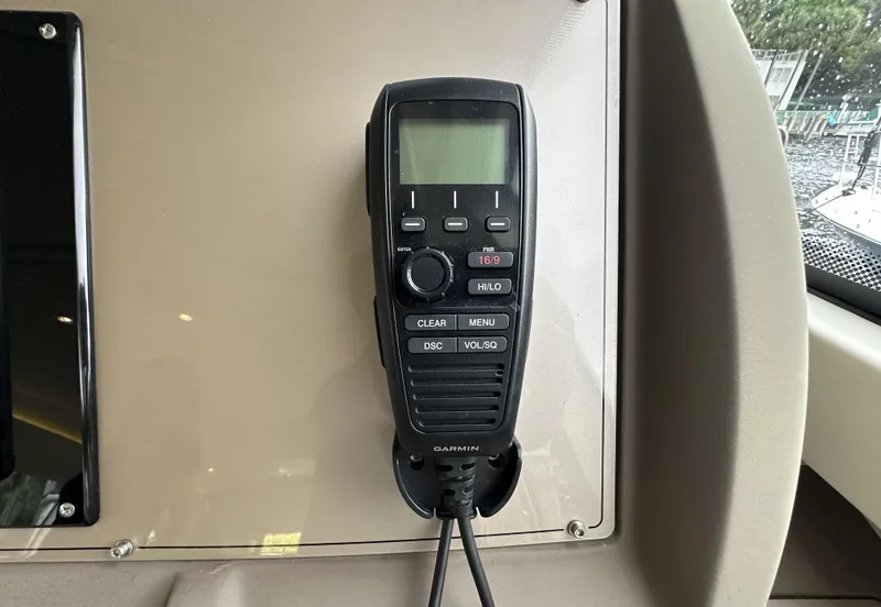 Slide: The Image of Garmin marine radio on 2014 Ferretti Yachts 530 dashboard. - 25