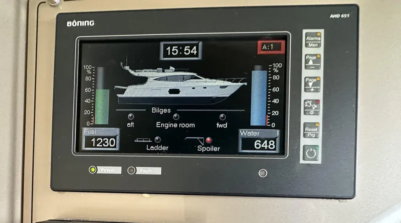 Slide: The Image of Control panel display of a 2014 Ferretti Yachts 530, showing fuel and water levels. - 26