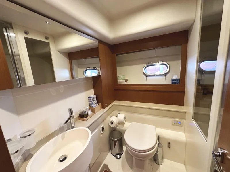 Slide: The Image of Luxurious bathroom in 2014 Ferretti Yachts 530, featuring modern fixtures and elegant design. - 32