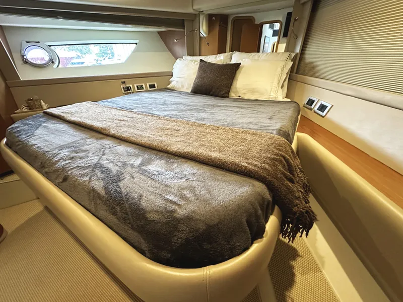 Slide: The Image of Luxurious bedroom interior of 2014 Ferretti Yachts 530 with elegant bedding and modern design. - 34