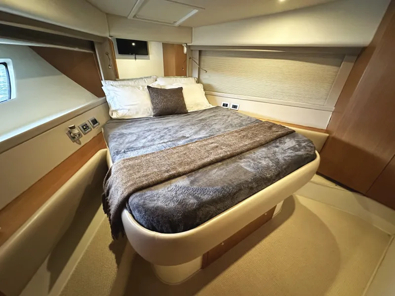 Slide: The Image of Luxurious bedroom interior of 2014 Ferretti Yachts 530 with cozy bedding. - 35