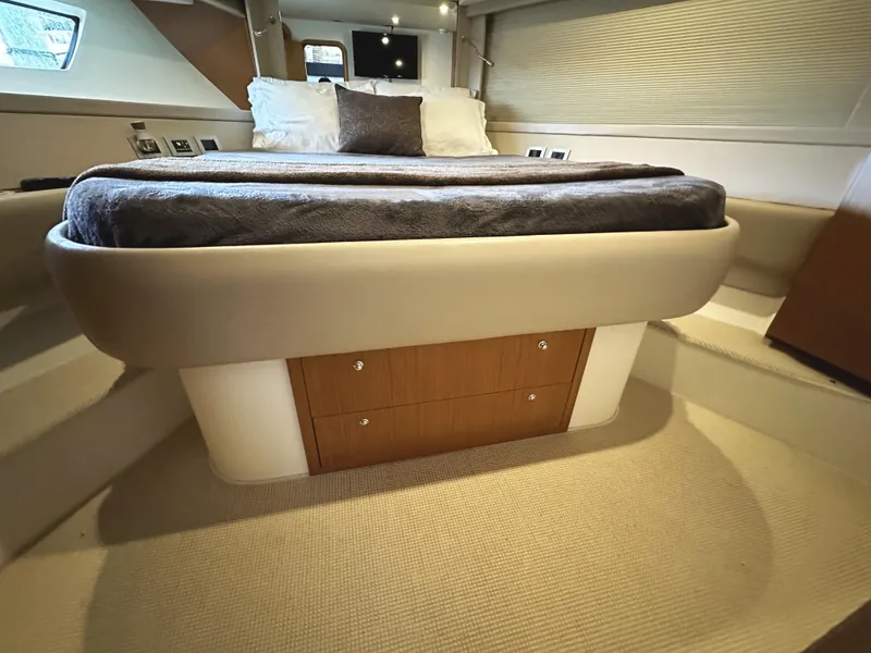 Slide: The Image of Luxurious bedroom interior of 2014 Ferretti Yachts 530 with modern design and cozy bedding. - 36