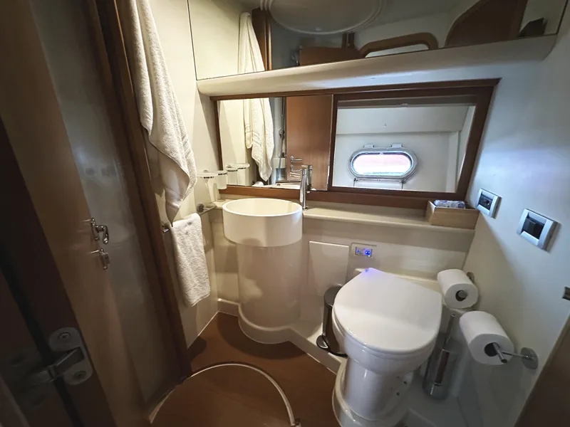 Slide: The Image of Luxurious bathroom in 2014 Ferretti Yachts 530, featuring modern fixtures and elegant design. - 39