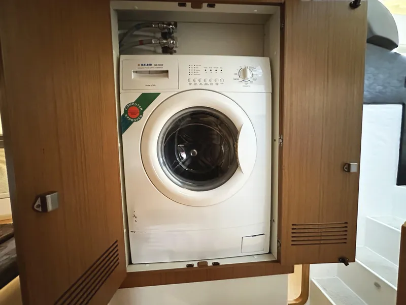 Slide: The Image of Washing machine inside 2014 Ferretti Yachts 530 wooden cabinet. - 41