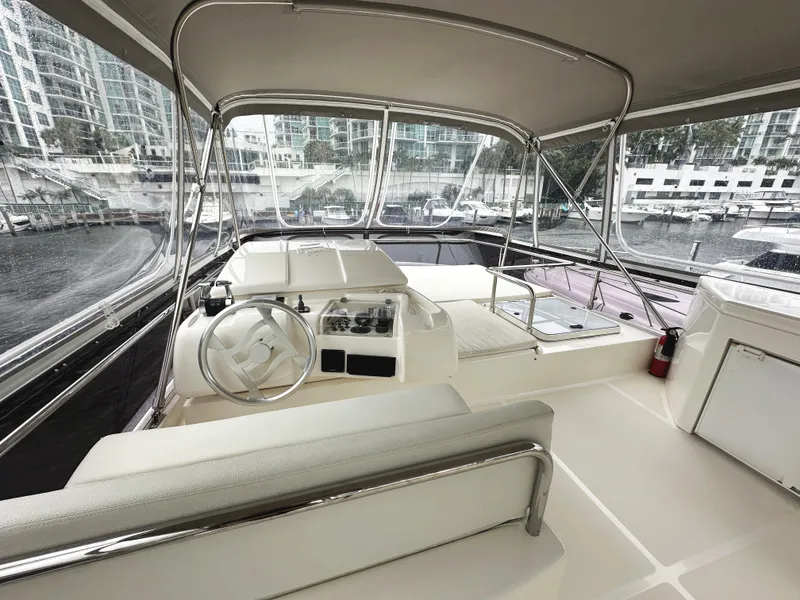 Slide: The Image of Interior view of 2014 Ferretti Yachts 530, featuring helm and seating area. - 42