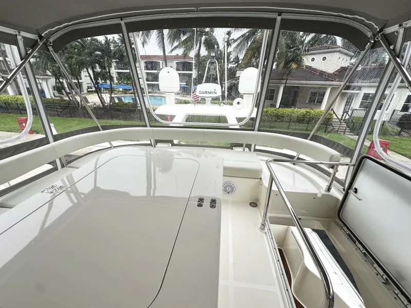 Slide: The Image of Ferretti Yachts 530, 2014 model, spacious deck with canopy and modern amenities. - 44