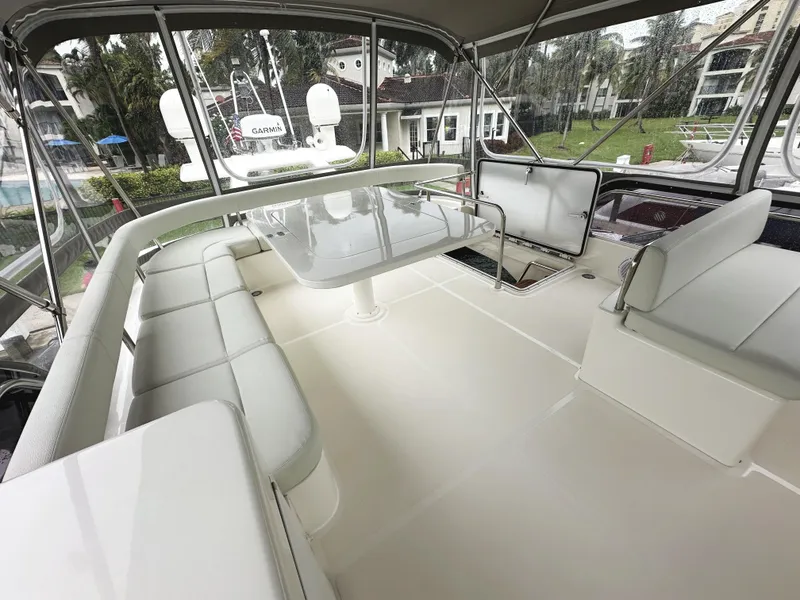 Slide: The Image of Spacious deck of 2014 Ferretti Yachts 530 with seating and table. - 49